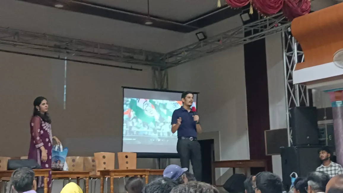 Ayush Jain speaking at a workshop