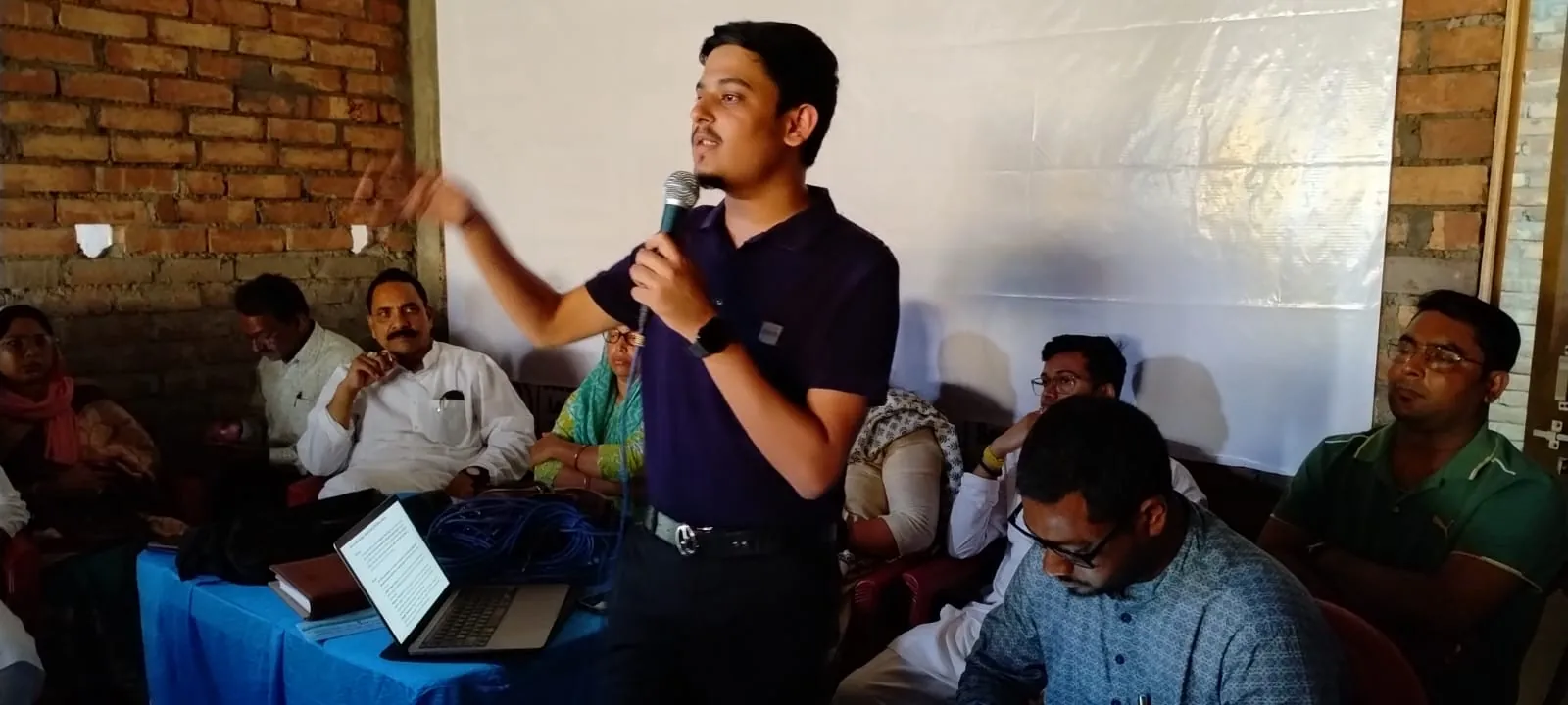 Ayush Jain addressing a campaign meeting